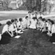 Students at Bryn Mawr’s Summer School for Women Workers in Industry pose for a group photo during an outdoor seminar. Image from National Photo Company, Library of Congress c. 1921.